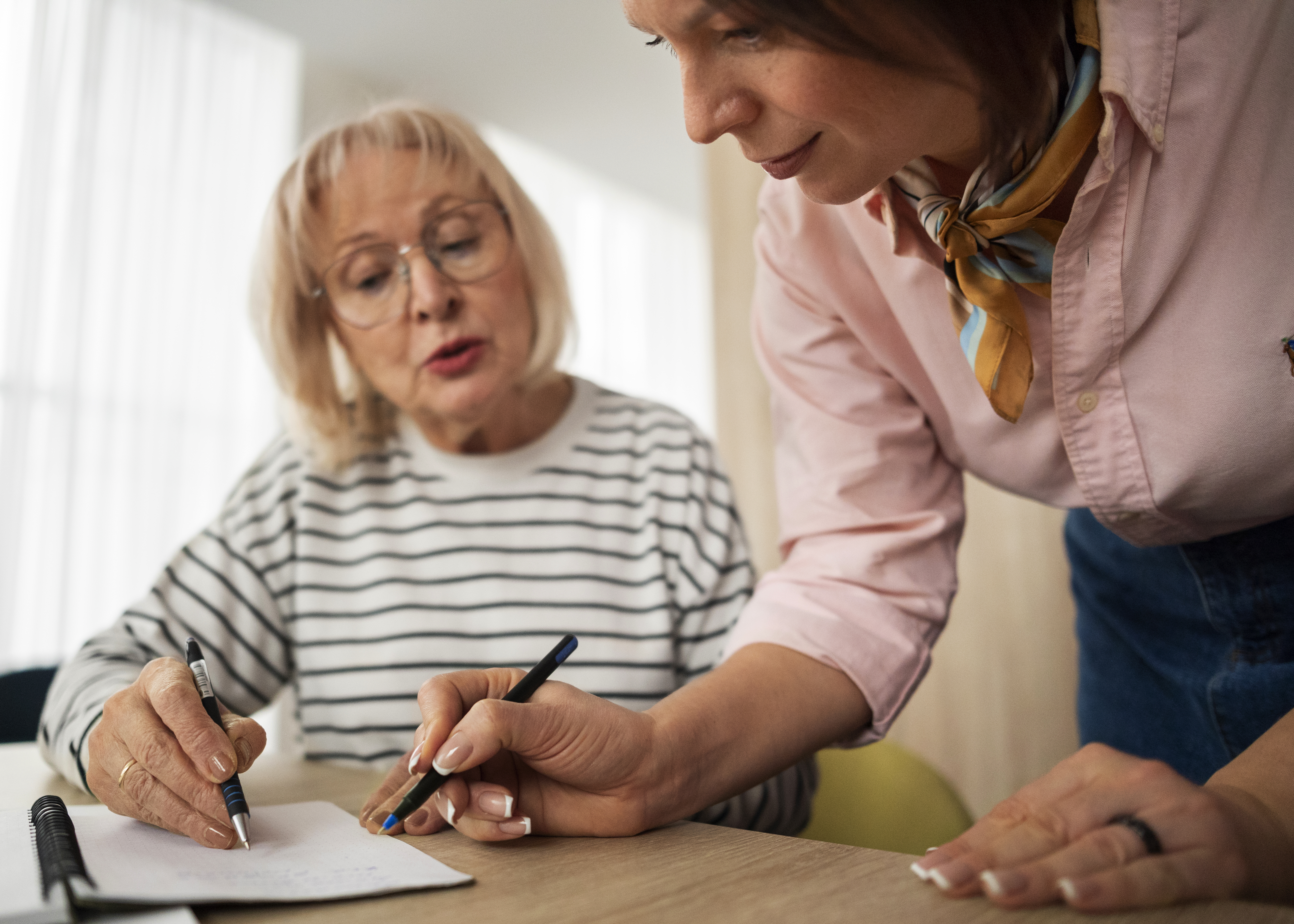 side-view-people-studying-classroom types of aged care