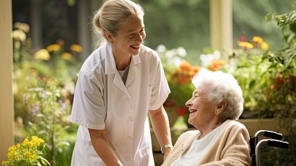 Elderly woman with care worker in aged care home