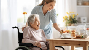 Elderly woman in a wheelchair with her carer showing high level in home care