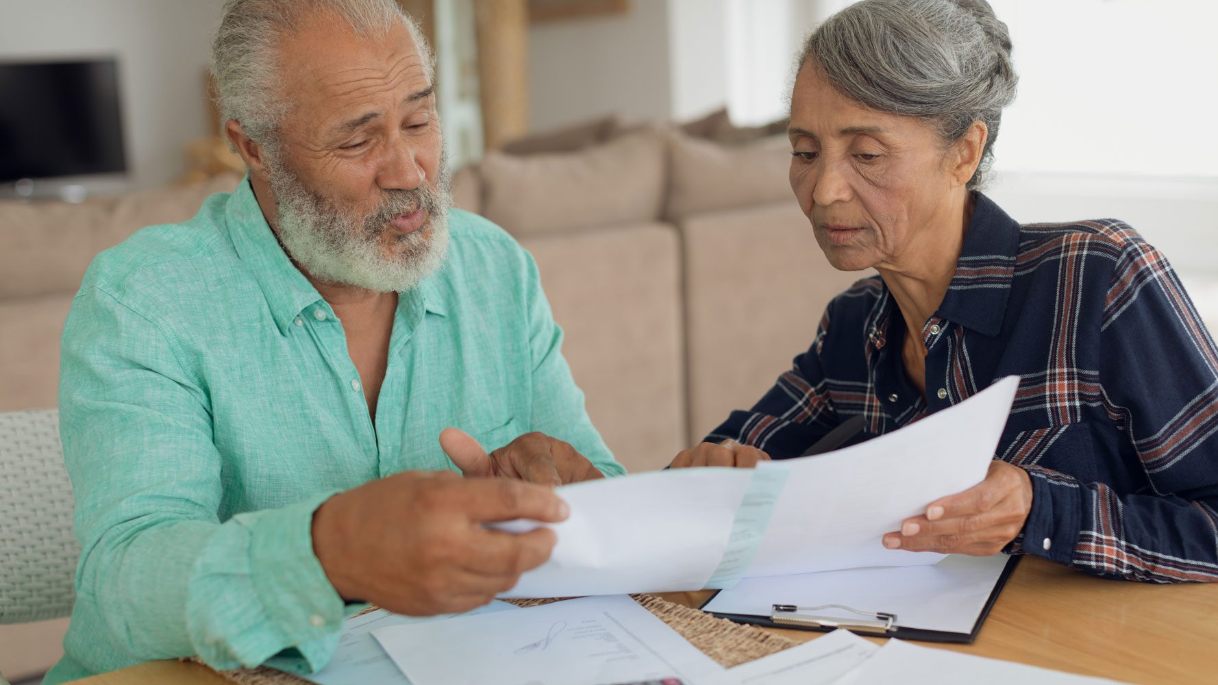 Senior-couple-calculating-finances