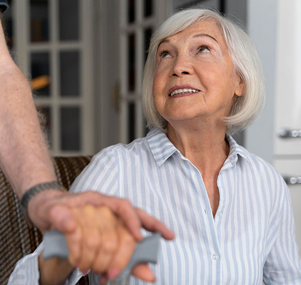 elderly-woman-looking-her-caregiver - Tasmania 